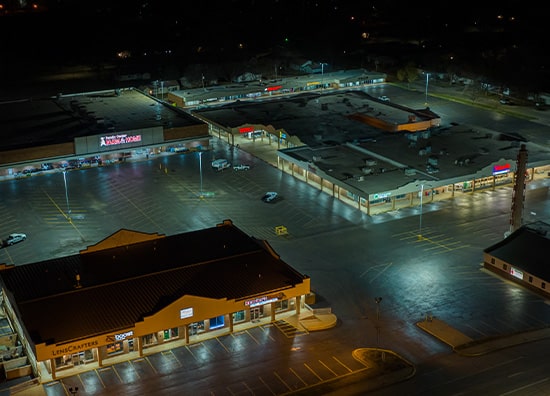 A nighttime aerial view of the State Fair Shopping center